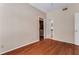 Bedroom with hardwood flooring, closet, and ensuite bathroom at 1250 Parkwood Se Cir # 1203, Atlanta, GA 30339