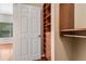 Walk-in closet features custom shelves and drawers, maximizing storage space at 1250 Parkwood Se Cir # 1203, Atlanta, GA 30339