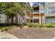 Community outdoor grill with covered seating area in a well-manicured yard, perfect for gatherings at 1250 Parkwood Se Cir # 1203, Atlanta, GA 30339