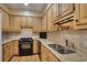 Updated kitchen featuring granite countertops, stainless steel appliances, and abundant cabinet space at 249 Sycamore Pl, Decatur, GA 30030