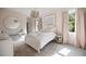 Charming bedroom with light pink color palette, large windows and lots of natural light at 304 Meadowbrook Ne Dr, Atlanta, GA 30342