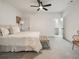 Spacious main bedroom with neutral carpet, white bedding, and an ensuite bathroom at 304 Meadowbrook Ne Dr, Atlanta, GA 30342