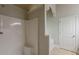 This bathroom features a tile floor, walk-in shower, and neutral color palette at 3912 Margaux Dr, Atlanta, GA 30349