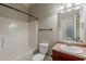 Clean, bright bathroom with a tub and vanity at 3912 Margaux Dr, Atlanta, GA 30349