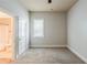 Carpeted bedroom with neutral walls and trim, featuring natural light at 3912 Margaux Dr, Atlanta, GA 30349