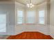 Bright dining area with large windows and wood flooring, perfect for Gathering meals at 3912 Margaux Dr, Atlanta, GA 30349