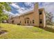 Backyard view of this large home showing the ample lawn space and outdoor living at 3912 Margaux Dr, Atlanta, GA 30349