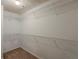 Spacious walk-in closet featuring shelving and a neutral color palette at 3912 Margaux Dr, Atlanta, GA 30349