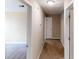 Bright hallway showcases neutral walls, carpeted floors, and access to multiple rooms at 5246 Salem Springs Pl, Lithonia, GA 30038