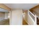 Spacious hallway with staircase and tiled flooring at 5246 Salem Springs Pl, Lithonia, GA 30038
