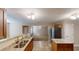 Open kitchen with granite countertops and stainless steel appliances, perfect for entertaining at 5246 Salem Springs Pl, Lithonia, GA 30038