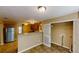 View of an open-concept layout featuring a kitchen and a laundry room at 5246 Salem Springs Pl, Lithonia, GA 30038