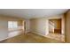 Spacious living room featuring access to the kitchen and a staircase, creating a welcoming atmosphere at 5246 Salem Springs Pl, Lithonia, GA 30038
