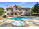 Backyard features an in-ground pool and spa with an outdoor gazebo creating a relaxing space at 825 Yosemite Dr, Suwanee, GA 30024
