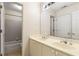 Bathroom features a double sink vanity and a bathtub with shower, perfect for a Gathering at 825 Yosemite Dr, Suwanee, GA 30024