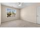 Bedroom with a ceiling fan, window with blinds, and neutral colored walls at 825 Yosemite Dr, Suwanee, GA 30024
