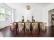 Dining room with hardwood floors, modern light fixture and seating for six at 118 Waverly Way, Atlanta, GA 30307