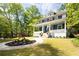 Stunning home featuring a beautifully landscaped yard, walkway and a large covered porch at 118 Waverly Way, Atlanta, GA 30307
