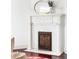 Close up of fireplace with metal door and decorative mantle at 118 Waverly Way, Atlanta, GA 30307