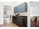 Galley kitchen with tile floors and dark cabinets at 118 Waverly Way, Atlanta, GA 30307