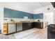 Kitchen with two tone cabinets, stainless steel appliances, and tile floors at 118 Waverly Way, Atlanta, GA 30307