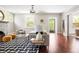 Cozy living room with rich hardwood floors, comfortable seating, and a vintage-inspired decor at 118 Waverly Way, Atlanta, GA 30307