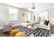 Bright and airy living room featuring large windows, stylish furnishings, and modern decor at 118 Waverly Way, Atlanta, GA 30307