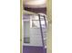 Unique loft area features a custom wardrobe, storage and ladder access to an elevated bed at 118 Waverly Way, Atlanta, GA 30307