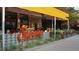 Outdoor dining area with stylish signage, creating a welcoming and trendy atmosphere at Superica Restaurant at 118 Waverly Way, Atlanta, GA 30307