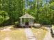 Charming gazebo in a serene setting, perfect for relaxation and picnics at 11865 Brisbane Dr, Alpharetta, GA 30009