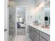 Bathroom featuring a double vanity, modern fixtures, and an ensuite bathroom view at 1717 Cosette Ln, Kennesaw, GA 30152