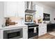 Well-equipped kitchen with stainless steel appliances, ample counter space, and white cabinets at 1717 Cosette Ln, Kennesaw, GA 30152