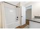 Clean bathroom with shower and granite-look sink at 209 Starr Cir, Stockbridge, GA 30281