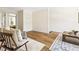 Versatile bonus room with hardwood floors, neutral walls, and contemporary furnishings, ideal for relaxation and entertainment at 209 Starr Cir, Stockbridge, GA 30281