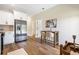 Bright kitchenette featuring stainless steel appliances and a small table for two in the breakfast nook at 209 Starr Cir, Stockbridge, GA 30281