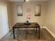 Dining room with modern table, transparent chairs, and stylish decor at 3385 Martin Luther King Jr Sw Dr, Atlanta, GA 30331