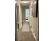 Bright hallway with wood-look floors leading to bathroom at 3385 Martin Luther King Jr Sw Dr, Atlanta, GA 30331