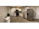 Bright, renovated kitchen with stainless steel appliances and ample counter space at 3385 Martin Luther King Jr Sw Dr, Atlanta, GA 30331