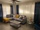 Comfortable living room with a large sectional sofa and plenty of natural light at 3385 Martin Luther King Jr Sw Dr, Atlanta, GA 30331