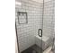Shower stall with a glass enclosure and a built in seat at 3385 Martin Luther King Jr Sw Dr, Atlanta, GA 30331