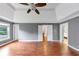 Hardwood floors and plenty of space make this primary bedroom a plus at 395 Clubfield Dr, Roswell, GA 30075