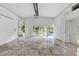 An open air patio offers a glimpse of trees and outdoor living at 395 Clubfield Dr, Roswell, GA 30075