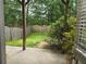 Private backyard featuring a patio area and a fenced-in lawn, offering great outdoor space at 106 Trailside Way, Hiram, GA 30141