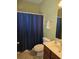 Bathroom with a tiled shower, modern fixtures, and a single sink vanity at 106 Trailside Way, Hiram, GA 30141