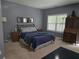 Well-lit bedroom featuring a window view and ample space at 106 Trailside Way, Hiram, GA 30141