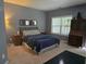 Serene bedroom with soft lighting, neutral colors, and ample closet space at 106 Trailside Way, Hiram, GA 30141