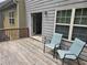 Outdoor deck with seating area, perfect for relaxing and entertaining guests at 106 Trailside Way, Hiram, GA 30141