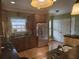 The well-lit kitchen shows wood cabinets and a stainless steel refrigerator at 106 Trailside Way, Hiram, GA 30141