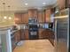 Well-equipped kitchen with stainless steel appliances, stylish cabinets, and granite countertops at 106 Trailside Way, Hiram, GA 30141