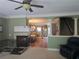 Spacious living room, fireplace, arched doorways, and view of the staircase at 106 Trailside Way, Hiram, GA 30141